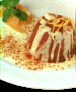 Budino de chocolate caliente con crema de naranja amarga